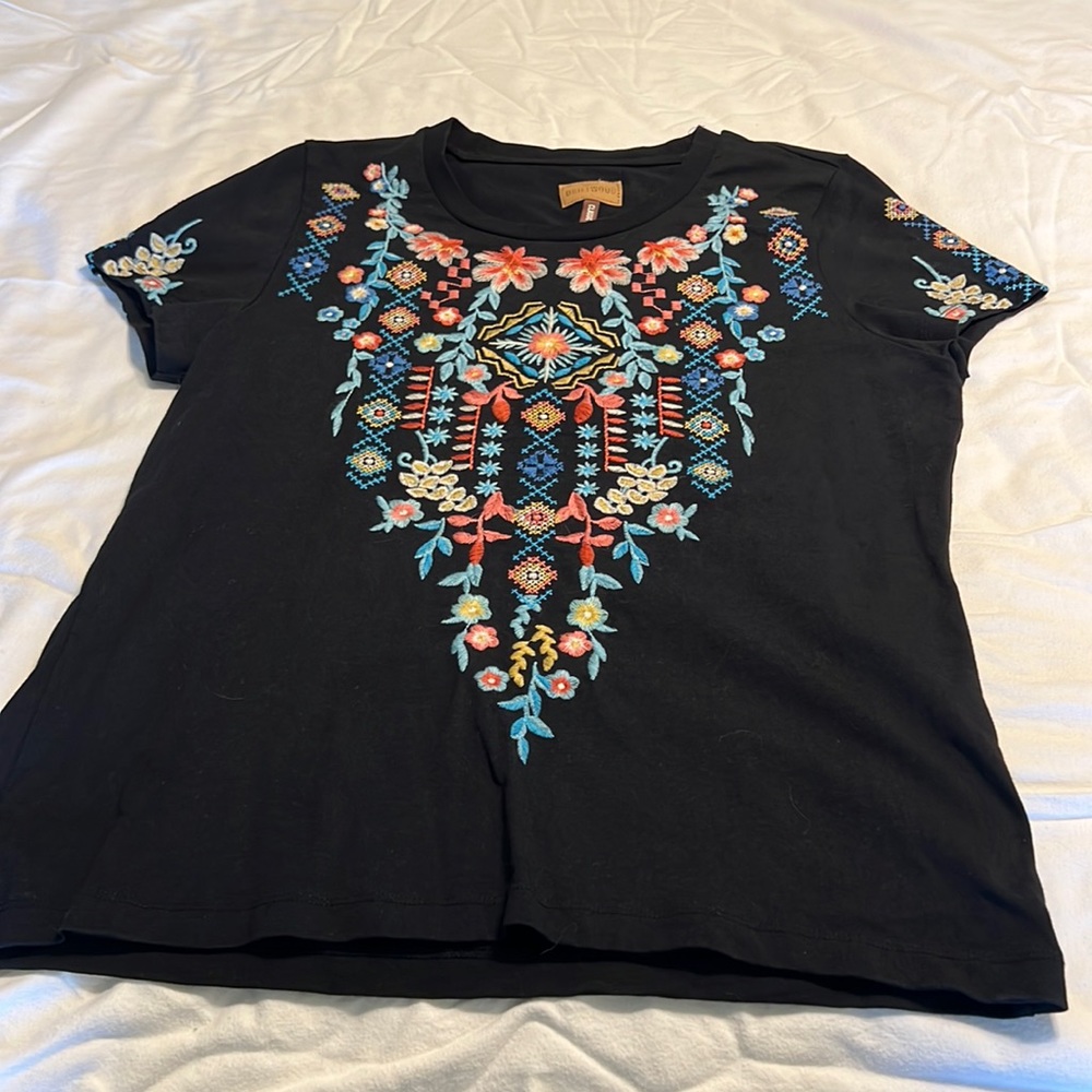 Sundance black t-shirt brand is Driftwood